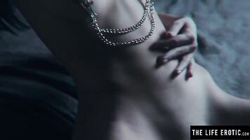 Ebony babe plays with a knife as she masturbates to orgasm